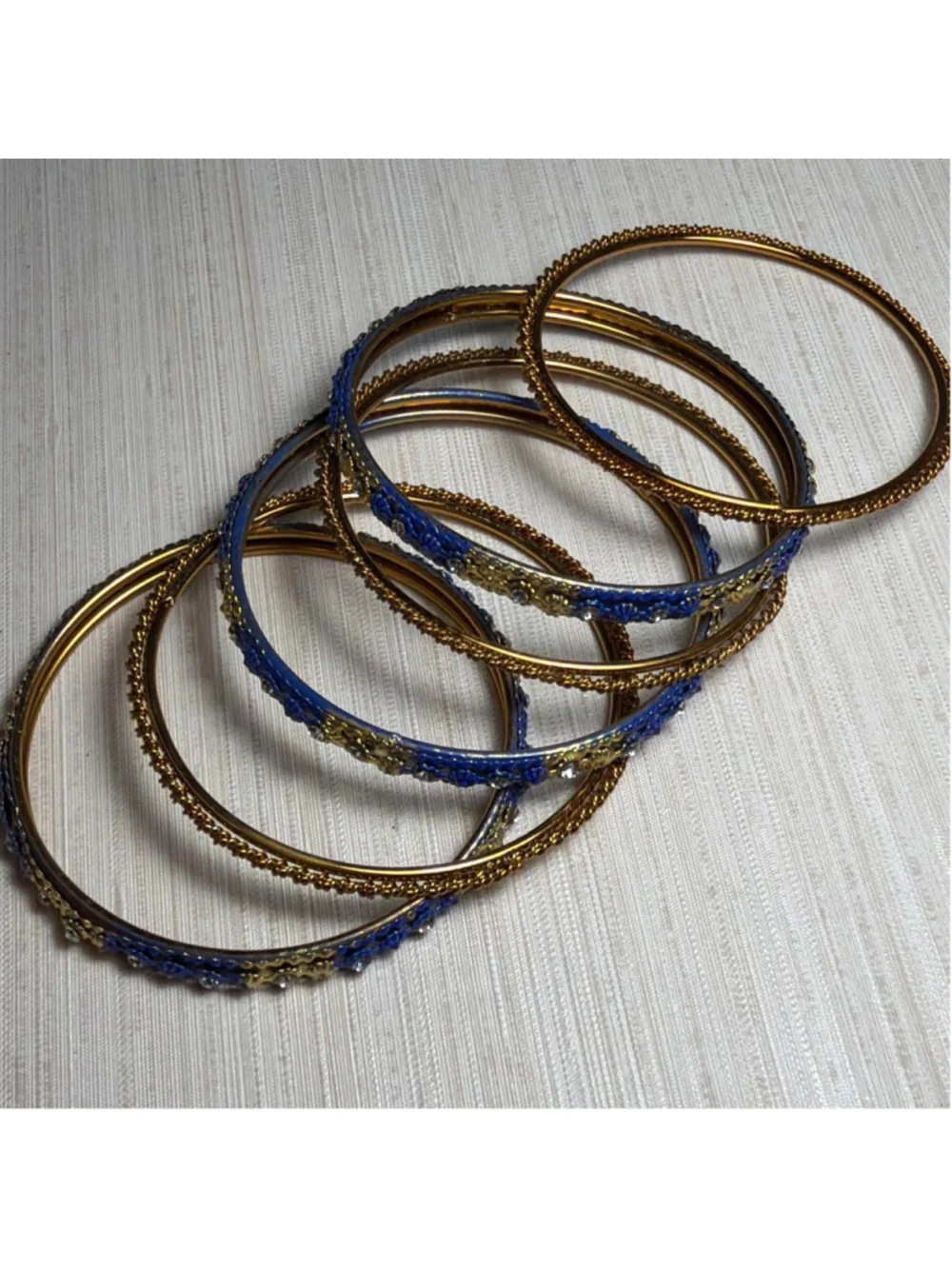 Blue and gold children's bangles set with rhinestones